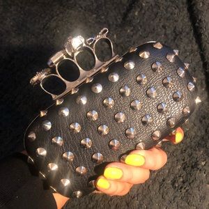 Brass knuckles clutch